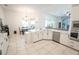 Spacious kitchen featuring a large island, stainless steel appliances, and open layout at 19951 Quinlan St, Orlando, FL 32833