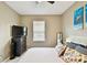 Bedroom with a TV above a dresser at 2409 Martins Run, Tavares, FL 32778
