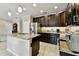 Kitchen featuring granite countertops, stainless steel appliances, and a modern design at 2409 Martins Run, Tavares, FL 32778