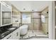 Stunning bathroom featuring a modern tub, glass shower enclosure, and stylish tile accents at 2777 Monticello Way, Kissimmee, FL 34741