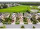 Well-maintained homes overlooking a vast green sports field and landscaped yards for Gathering enjoyment at 2777 Monticello Way, Kissimmee, FL 34741