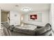 Comfortable living room with modern fireplace, stylish flooring, and open access to other living spaces at 2777 Monticello Way, Kissimmee, FL 34741