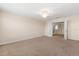 Upstairs bedroom featuring carpeted floor, neutral-colored walls, and a ceiling fan at 3578 Cortland Dr, Davenport, FL 33837