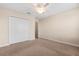 Bedroom featuring carpet flooring, neutral walls, and a closet at 3578 Cortland Dr, Davenport, FL 33837