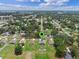 Aerial view of property in residential area near Umatilla Middle and High School at 382 Lake St, Umatilla, FL 32784