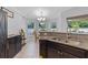 Bright breakfast nook with natural light, views of the outdoors, and a cozy dining set at 382 Lake St, Umatilla, FL 32784
