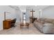 Bright living room featuring tile flooring, a cozy sofa, and natural light at 382 Lake St, Umatilla, FL 32784