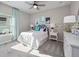 Inviting bedroom with neutral tones, modern décor, and plenty of natural light at 4413 Lions Gate Ave, Clermont, FL 34711