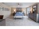 Cozy bedroom with neutral color scheme, stylish furnishings, and serene decor at 4413 Lions Gate Ave, Clermont, FL 34711