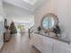 Inviting entryway featuring a decorative mirror and holiday decorations at 4413 Lions Gate Ave, Clermont, FL 34711