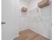Walk-in closet with ample shelving and rod space for optimal organization at 4413 Lions Gate Ave, Clermont, FL 34711