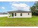 Well maintained backyard of single story home with a covered porch at 4780 Sw 129Th Pl, Ocala, FL 34473