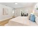 Bedroom with light hardwood floors, neutral walls, and sliding glass doors to the patio at 4858 Brenda Dr, Orlando, FL 32812