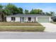 Charming single story home with fresh exterior paint, well manicured front yard and delightful curb appeal at 4858 Brenda Dr, Orlando, FL 32812