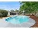 Enjoy this backyard pool with screened in porch and mature landscaping at 4858 Brenda Dr, Orlando, FL 32812