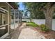 This home features an outdoor patio, a spa, and mature landscaping at 489 Penny Ln, Maitland, FL 32751