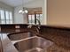 Kitchen counter with granite countertops with stainless steel dual sinks and fixture at 541 Arena Dr, Davenport, FL 33837