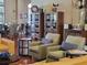 Inviting lounge area with comfortable seating, bookshelves, and stylish decor, perfect for relaxation at 541 Arena Dr, Davenport, FL 33837