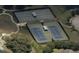 Aerial view of the community's well-maintained tennis courts at 541 Arena Dr, Davenport, FL 33837