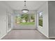 Dining area with abundant natural light and a view of the pond at 5436 E Michigan St # 7, Orlando, FL 32812