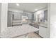 Bright kitchen with stainless steel appliances and granite countertops at 5436 E Michigan St # 7, Orlando, FL 32812