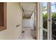 A screened-in lanai offers an inviting outdoor retreat, perfect for relaxation, and enjoyment of the surrounding nature at 5436 E Michigan St # 7, Orlando, FL 32812