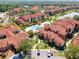 Ariel image highlighting the community pool and green space around the condo buildings at 5500 Metrowest Blvd # 203, Orlando, FL 32811