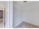 Walk-in closet with carpet and shelving at 5500 Metrowest Blvd # 203, Orlando, FL 32811