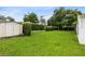 Well-maintained backyard with plenty of green space at 609 Langholm Dr, Winter Park, FL 32789