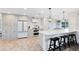 Modern kitchen with custom cabinets, updated appliances, a breakfast bar, and great natural light at 609 Langholm Dr, Winter Park, FL 32789