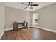 Bright bedroom features a ceiling fan, and a desk perfect for studying or working from home at 6321 Clearmeadow Ct, Windermere, FL 34786