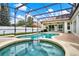 Enjoy outdoor Florida living with your private screened-in pool, spa, and ample deck space at 6321 Clearmeadow Ct, Windermere, FL 34786