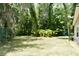 Spacious backyard featuring green grass and fence at 637 15Th St, Debary, FL 32713