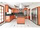 Spacious kitchen features wood cabinets, stainless steel appliances and a large island at 637 15Th St, Debary, FL 32713