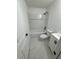 Updated bathroom with a new bathtub, shower, vanity, and fixtures at 6849 Palomino Dr, Lakeland, FL 33811
