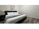 Bedroom with wood flooring and natural light at 720 Las Fuentes Dr, Kissimmee, FL 34746
