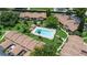 Aerial view of the community pool surrounded by landscaped grounds and townhomes at 818 Park Lake Cir # 10, Maitland, FL 32751