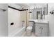 Bright bathroom features a shower-tub, vanity, and neutral decor at 818 Park Lake Cir # 10, Maitland, FL 32751