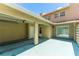 Exterior angle showcasing the spacious outdoor garage and entrance to the house at 818 Park Lake Cir # 10, Maitland, FL 32751
