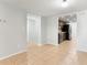 Open kitchen and dining area with tiled floor and modern appliances at 818 Park Lake Cir # 10, Maitland, FL 32751