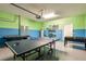 Finished game room featuring a ping pong table, foosball table, and pool table at 8801 Corcovado Dr, Kissimmee, FL 34747