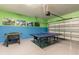 Spacious game room with foosball and ping pong table at 8801 Corcovado Dr, Kissimmee, FL 34747