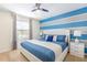 Comfortable main bedroom with a plush bed, modern lamps, and a bright, airy feel at 8801 Corcovado Dr, Kissimmee, FL 34747