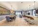 Expansive open-concept living space seamlessly blends kitchen, dining, and living areas for modern living at 8801 Corcovado Dr, Kissimmee, FL 34747