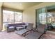 Screened patio with comfortable lounge seating and relaxing sun loungers at 8801 Corcovado Dr, Kissimmee, FL 34747