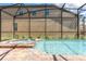 Relaxing swimming pool with a spa and brick-paved deck at 8801 Corcovado Dr, Kissimmee, FL 34747