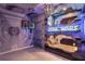 Unique bedroom with custom bunk beds, Star Wars decor, TV and spaceship themed features at 8801 Macapa Dr, Kissimmee, FL 34747