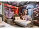 Bedroom with an Alice in Wonderland theme, decorative ceiling, and twin beds at 8801 Macapa Dr, Kissimmee, FL 34747
