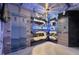 Star Wars themed ' bedroom featuring custom bunk beds, themed lighting, and unique decor at 8801 Macapa Dr, Kissimmee, FL 34747