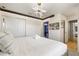 Bedroom with a luxurious bed, modern lighting, and mounted TV at 8801 Macapa Dr, Kissimmee, FL 34747
